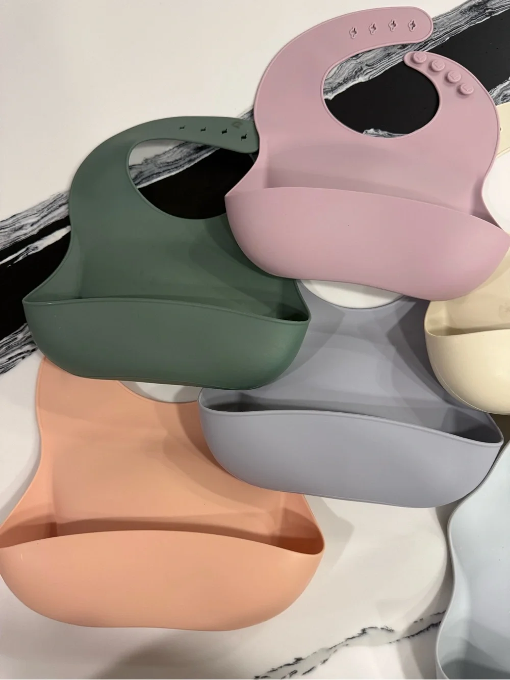 Mushie Adjustable Silicone Baby Bib Set in Pink, Green, Cream, Gray, Peach, Blue
